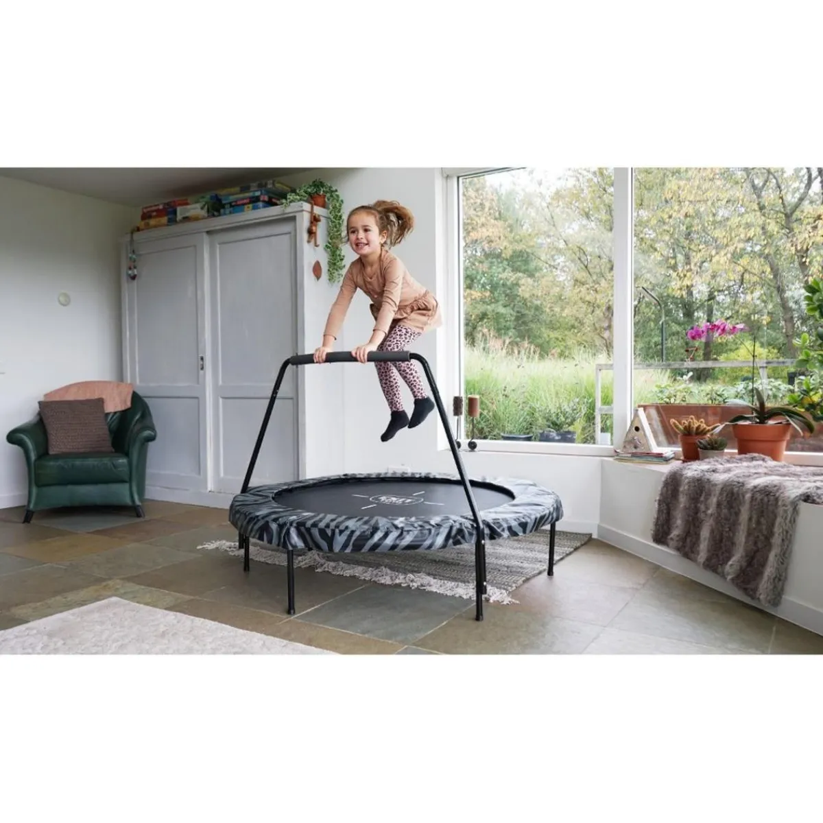 Online Exit - Cama elástica Junior Tiggy negro/gris con barra de apoyo Camas Elásticas