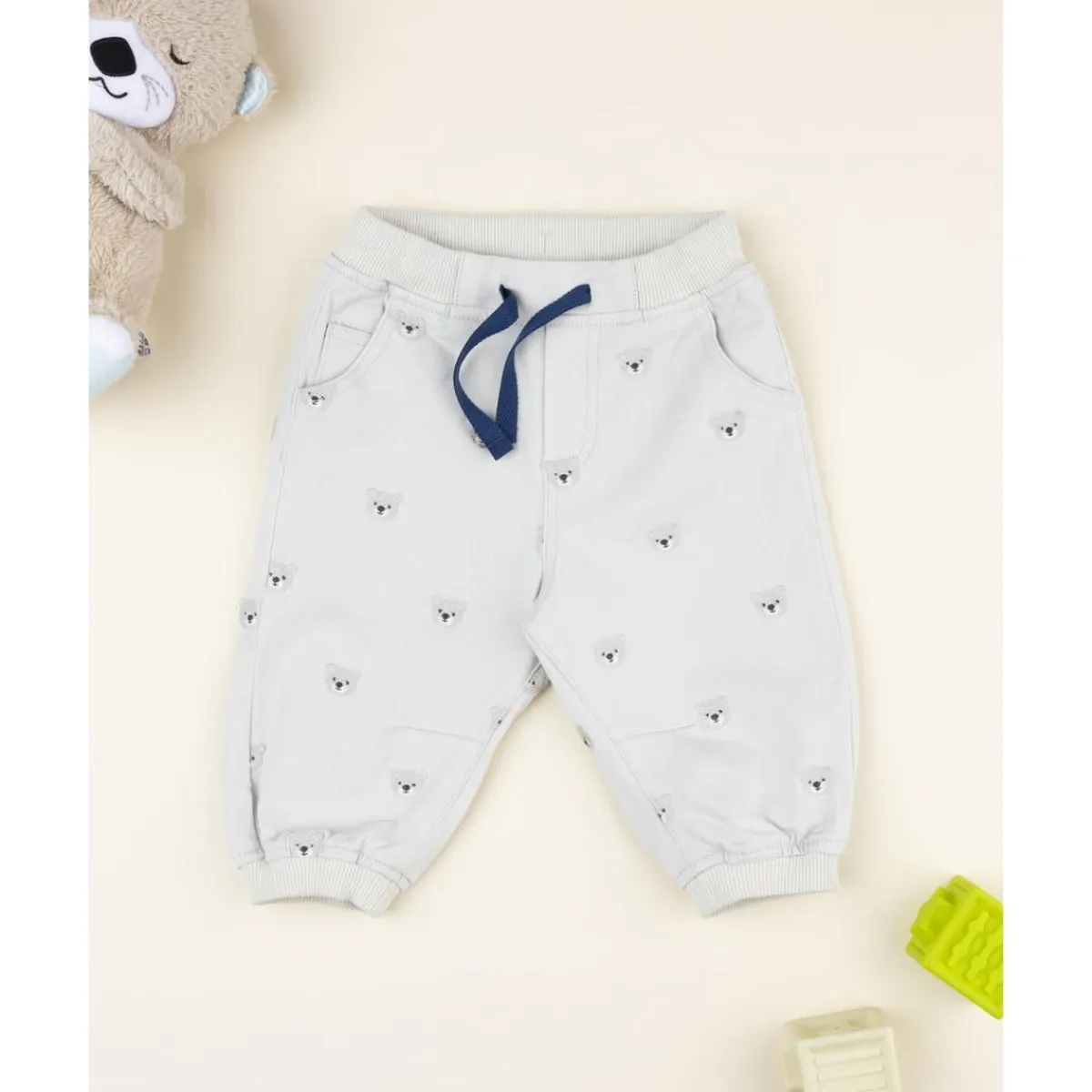 Pantalón beige de niño con estampado allover de ositos*Prenatal