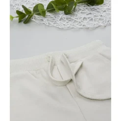 Pantalones niño beige estampado relieve*Prenatal Clearance