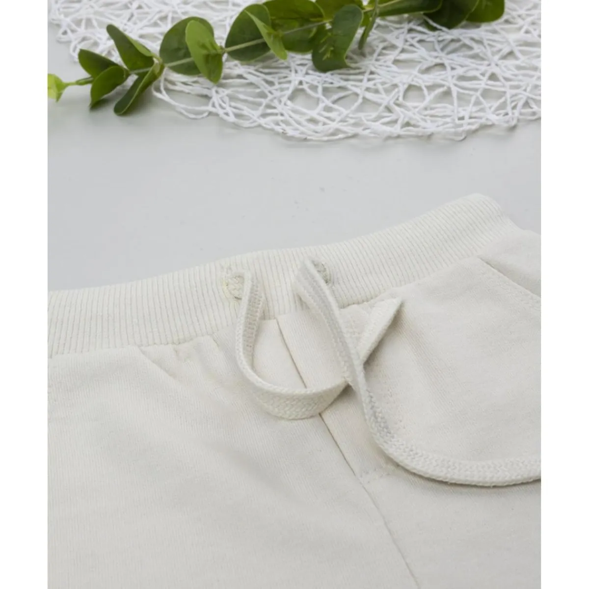 Pantalones niño beige estampado relieve*Prenatal Clearance